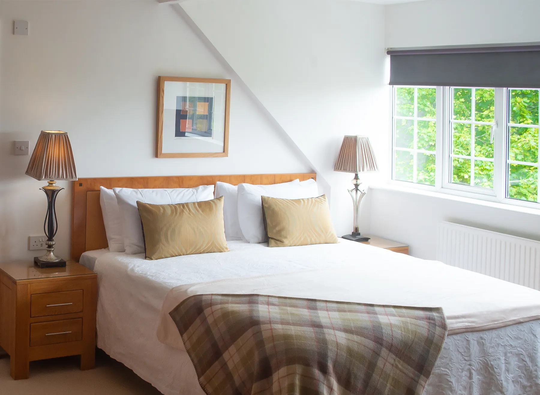 Room 3, a first-floor luxury suite at Higher Faugan Parc, with super-king bed under the eaves