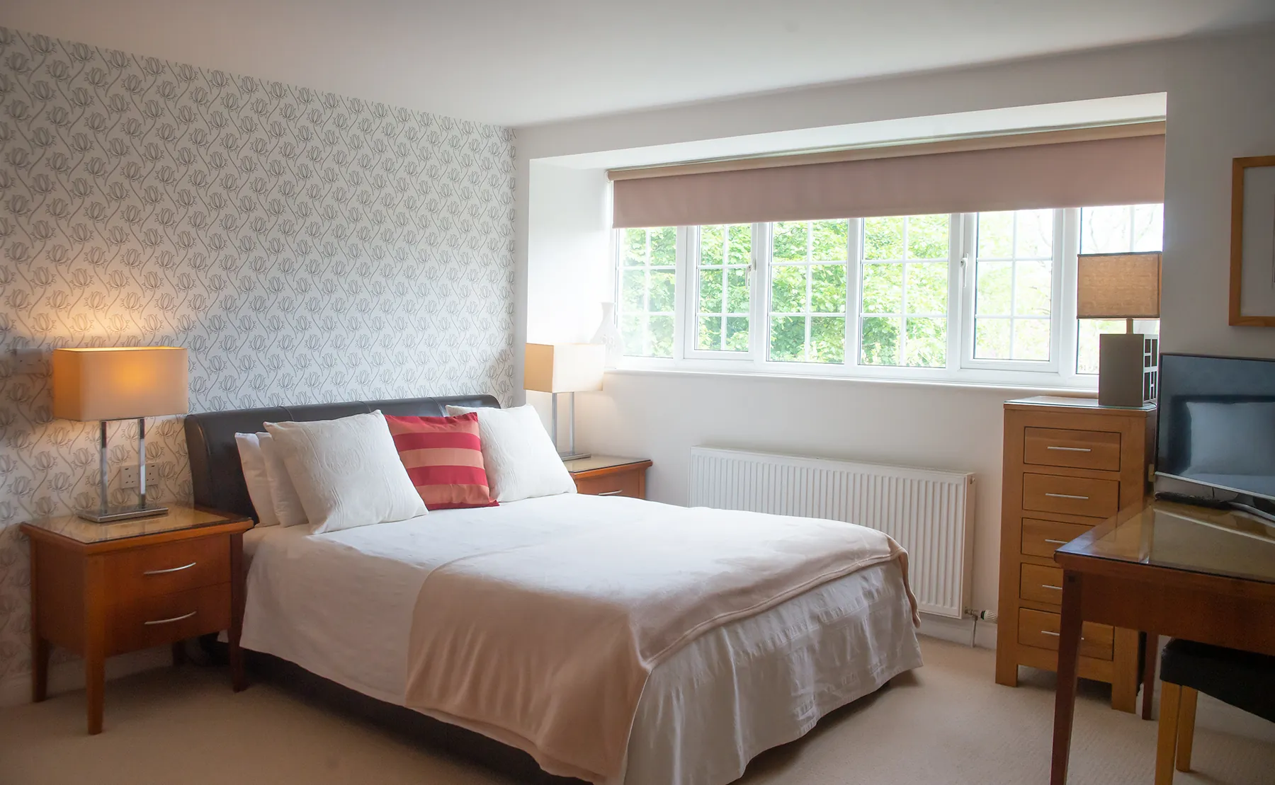 Room 1 at Higher Faugan Parc: king-size bed beside the garden window