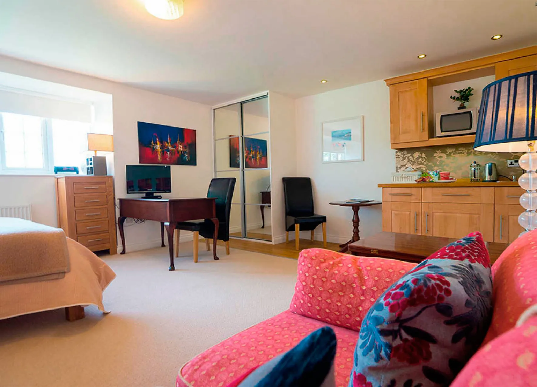 Room 1 at Higher Faugan Parc: the kitchen area of the suite with refrigerator and microwave