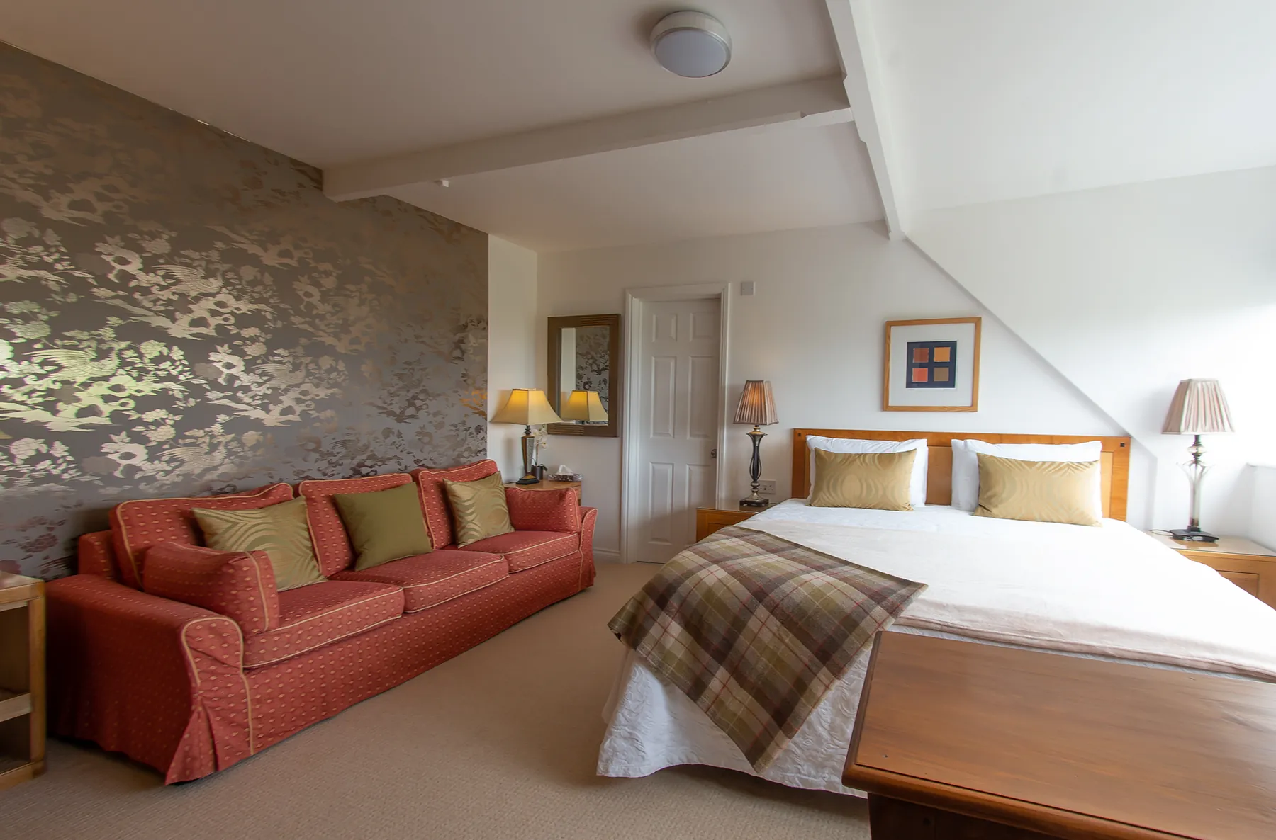 Room 3 at Higher Faugan Parc: sofa and bed in the first-floor suite