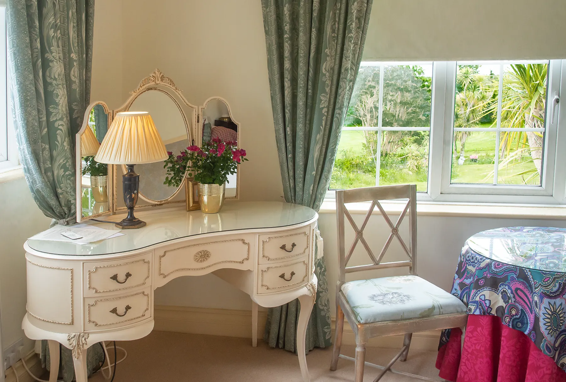 Room 7 at Higher Faugan Parc: painted dressing table beside the garden window